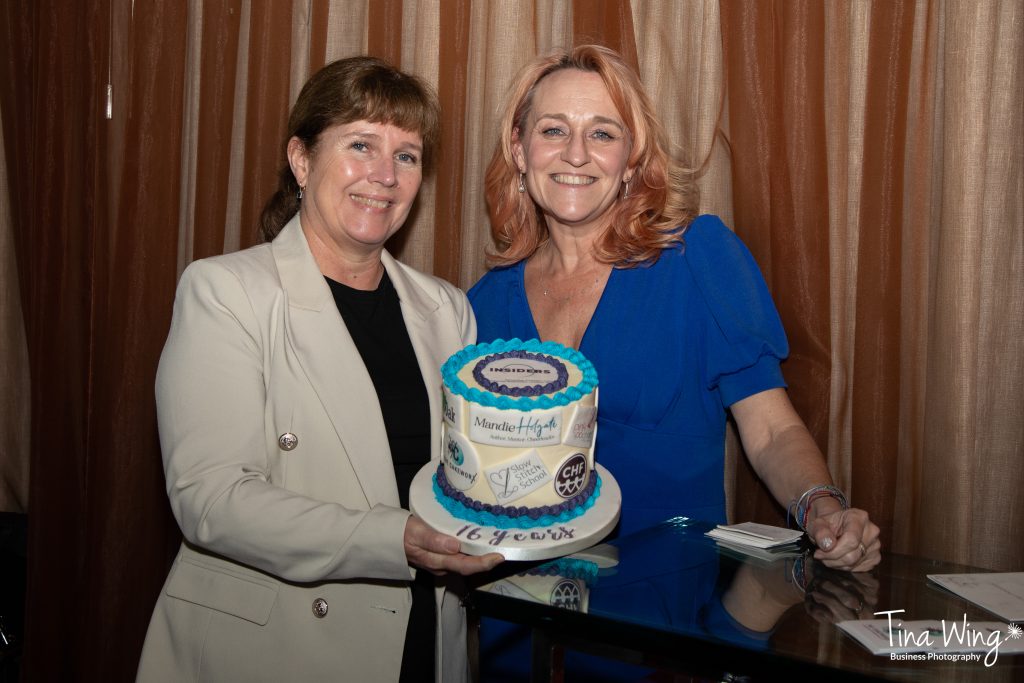 Stephanie Blythe from Cakeworx and Mandie holgate founder of the BWN INsiders pose with BWN INsiders networking cake.